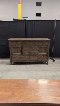 Spacious Dark Wood Magnussen Home Dresser with Varied Storage