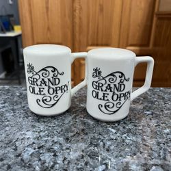 Vintage Ceramic “The Grand Ole Opry” souvenir pair of salt and pepper shakers.  Size approximately  3 1/4 inches tall.  Brand new with stickers 