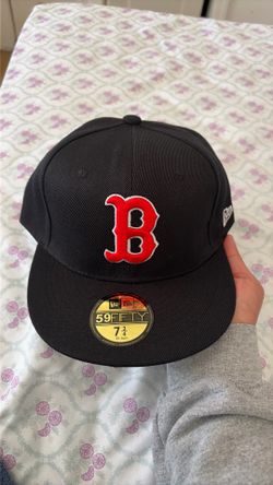 I'm selling a new era cap, it's new,  , I'm selling it because it didn't fit me size 7 3/4 black color