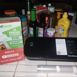 Food Saver With Rolls $50