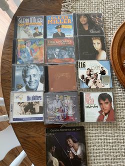 15 Cd's:  Frank Sinatra, Celine Dion, Elvis Presley, Green Miller, Tony Bennet, The Platters, The Carpenters, Whitney Houston, different jazz and blue