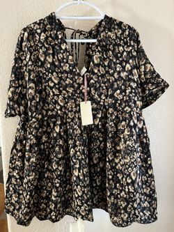 Top with slight open back