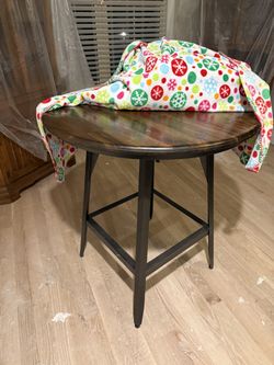 Bar height table and 4 swivel chairs