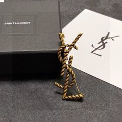 Classic gold twisted rope YSL brooch
