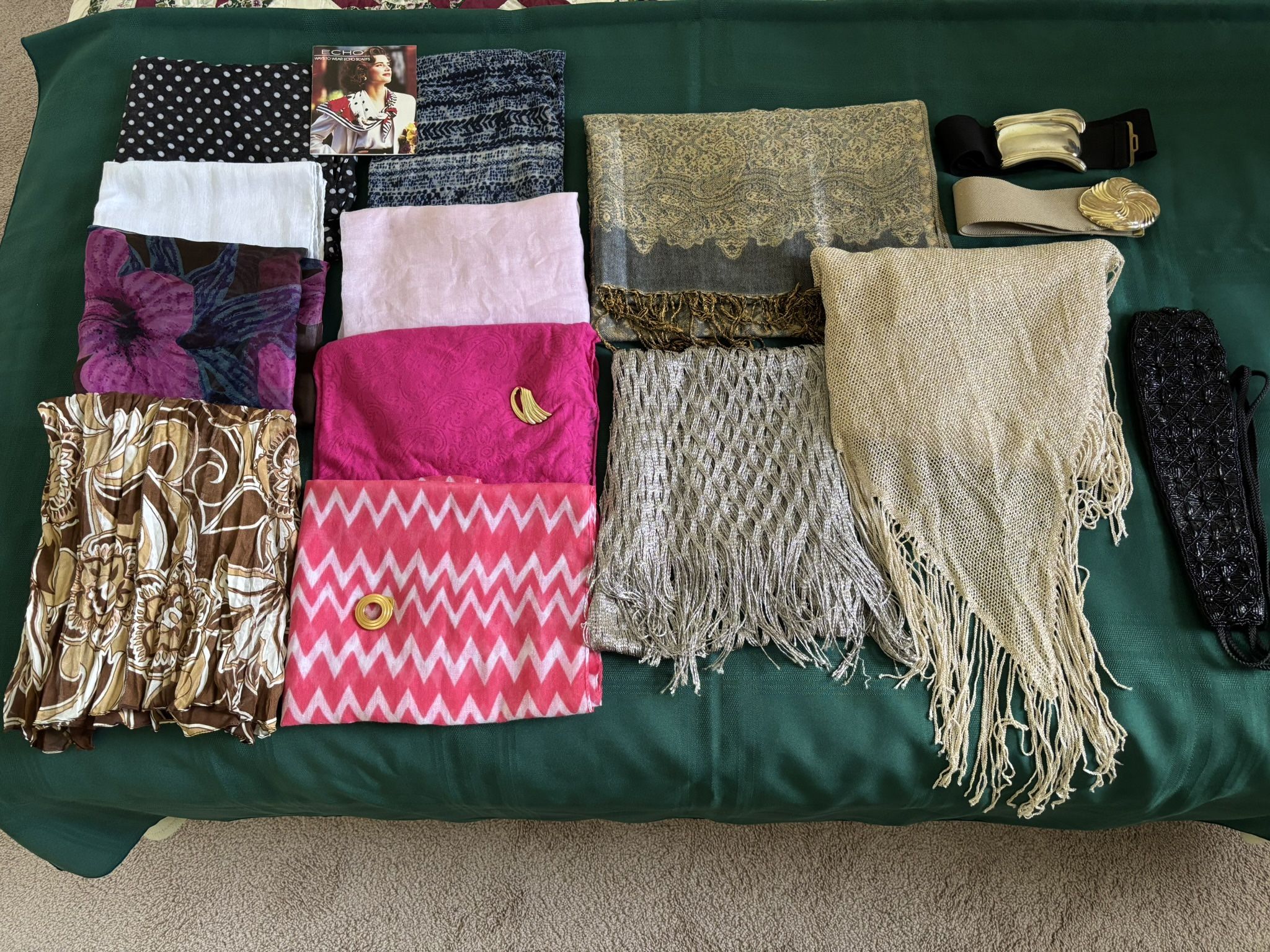 Scarfs, Shawls and Belts, lot of 17 pieces. 8 scarfs, 3 shawls, 3 belts (2 expandable, 1 medium), 2 scarf pins, 1 scarf booklet. Excellent condition.