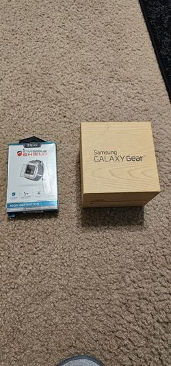 NEW SAMSUNG GALAXY GEAR V700 WITH NEW SCREEN PROTECTOR 