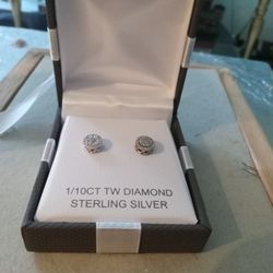 Silver earrings with diamonds. God damn For 200 Selling For $100