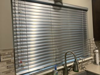 NEW Stainless steel mini blinds. 51 1/4 inches long