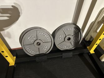 4 Olympic Cast Iron Plates
