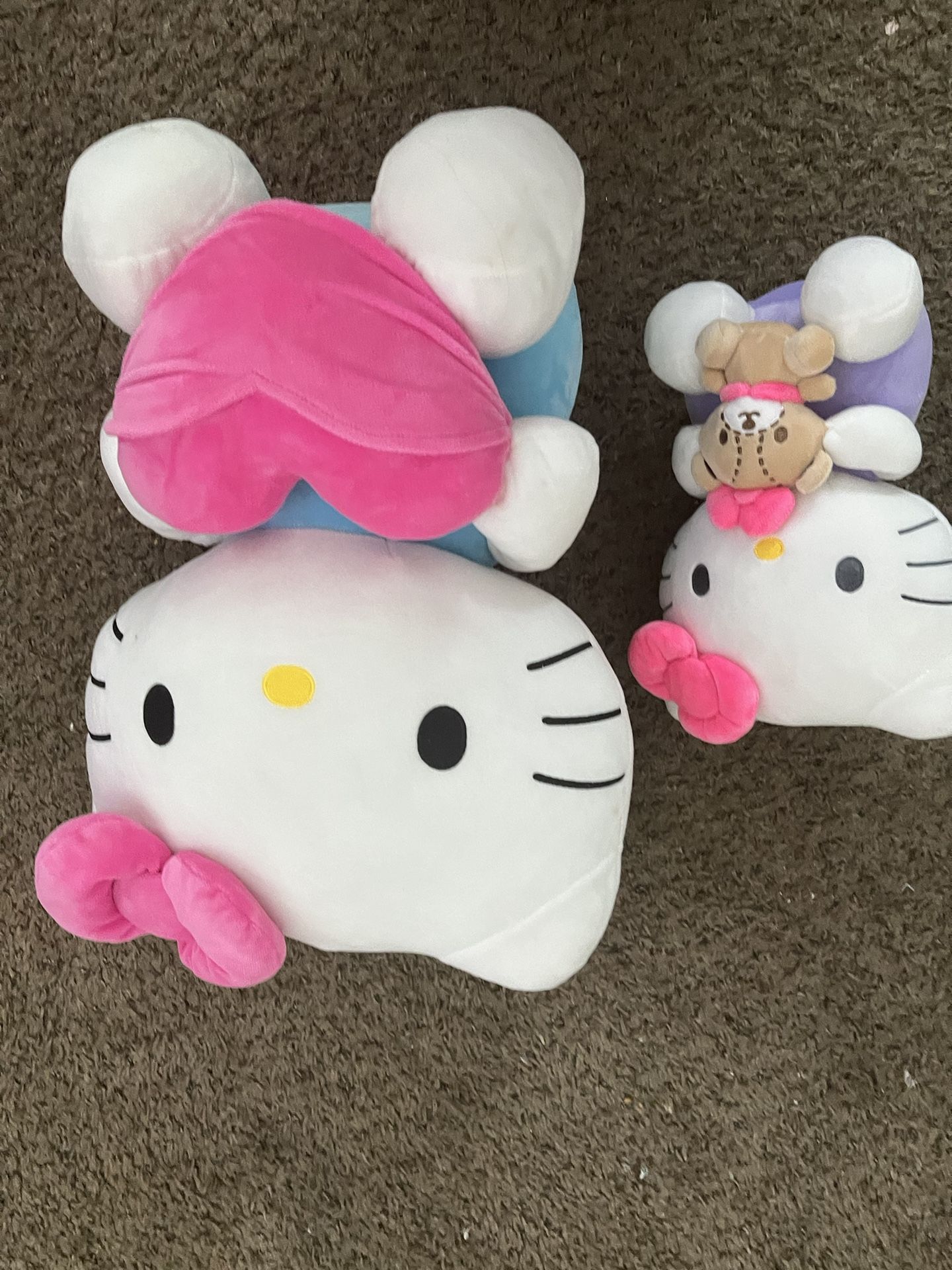 both hello kitty stuffed animals 