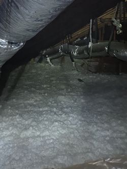Blowin Attic Insulation Soplada