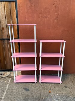Pair of matching pink and white shelves