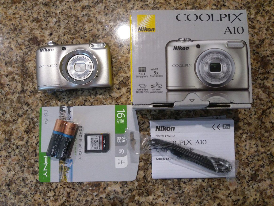 Nikon Coolpix A10 camera, 16MPixels, HD video, 16GB SD, Tripod, Case , New in Box