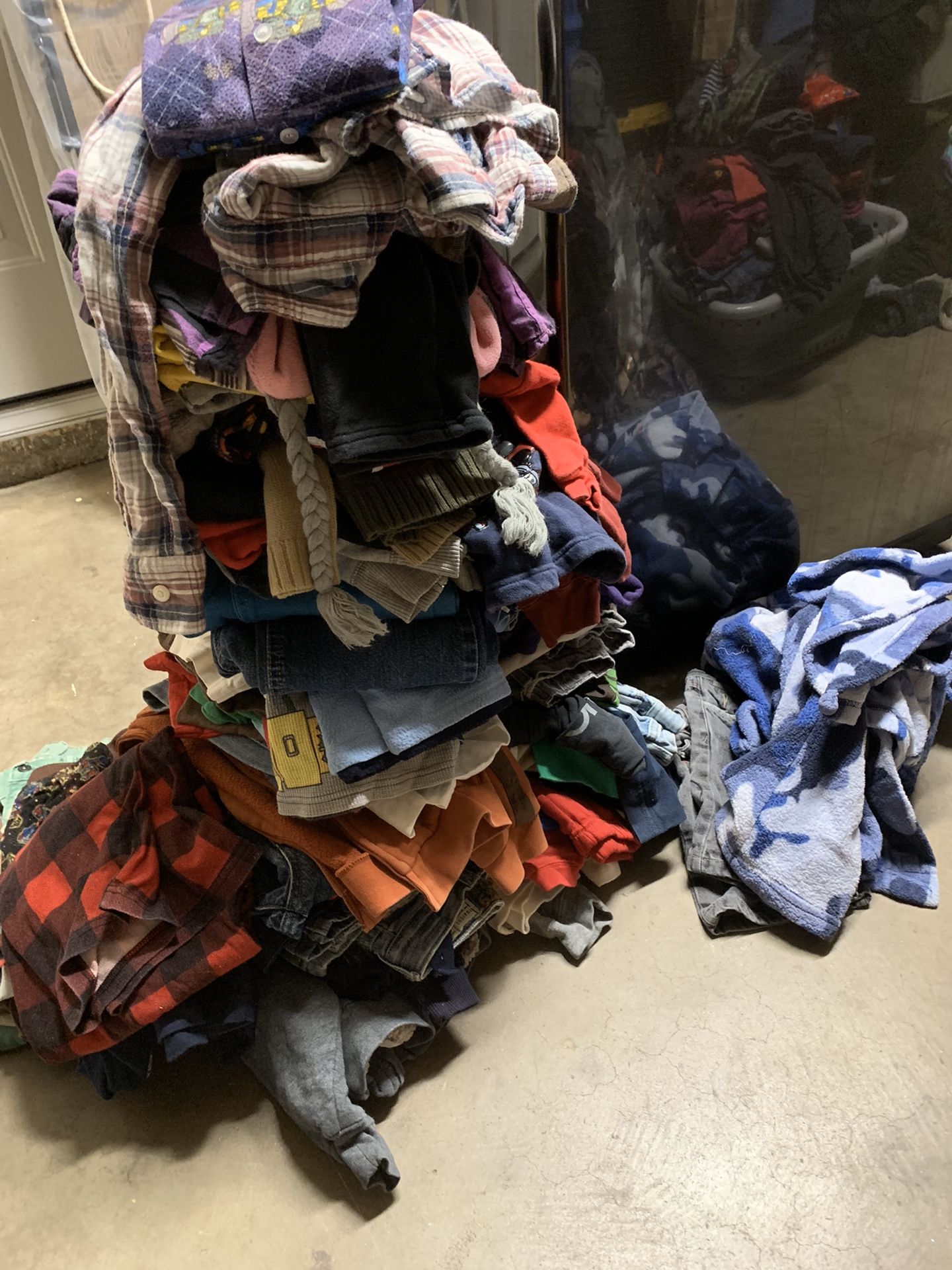 Three full bags of kids clothes from 4-10 yrs mixed.