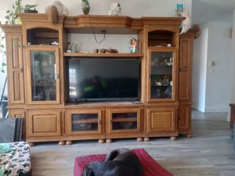 solid oak sectional entertainment center free?