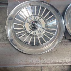 55 Ford Hub Caps $150