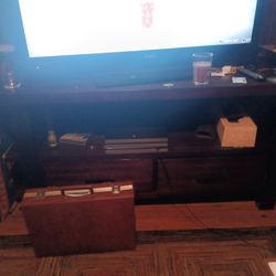 Tv entertainment center with drawers or coffee table