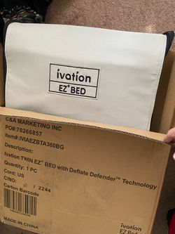 Inflatable bed on a frame with rolling case