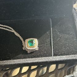 Kay Jewelers diamonds, emerald and white gold necklace Images may be subject to copyright. Learn