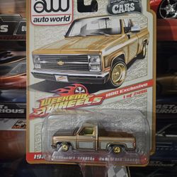 AUTO WORLD HDC WEEKEND OF WHEELS 1983 CHEVROLET SILVERADO LOWRIDER GOLD