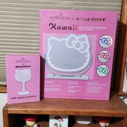 Impressions Hello Kitty LED Wall Mirror + Hello Kitty LED Handheld Makeup Mirror With Standing Base