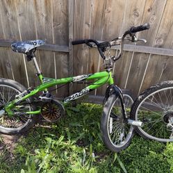 20-inch Kent Chaos Boys' Freestyle Bike in neon green