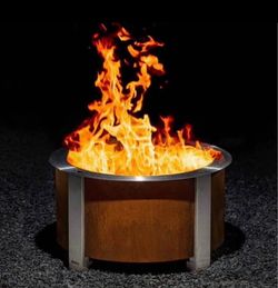 Breeo X-Series 24-Smokeless Fire Pit - Heavy-Gauge Steel Material - Corten Steel Open box The X Series 24 fire pit offers a smokeless, durable des