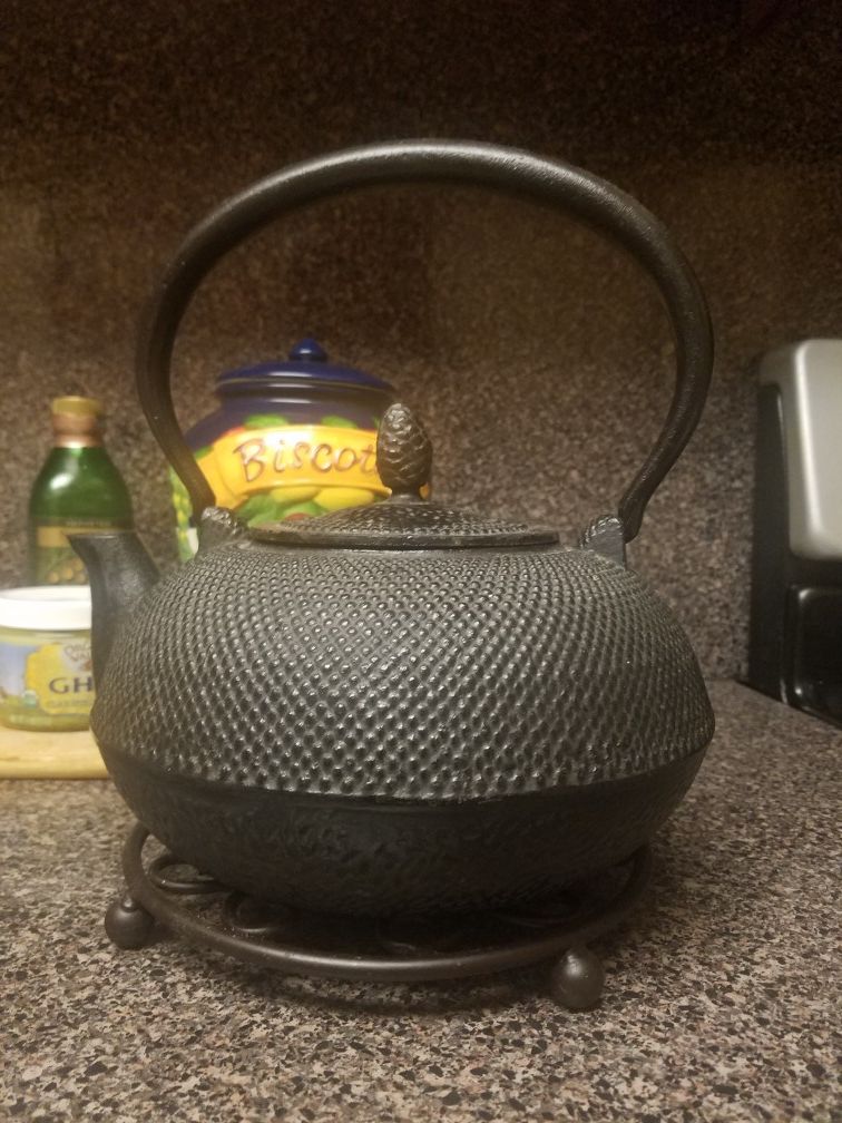 Black Iron tea kettle with lovely holder. Still Available
