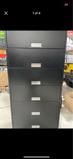 Black metal cabinet with drawers