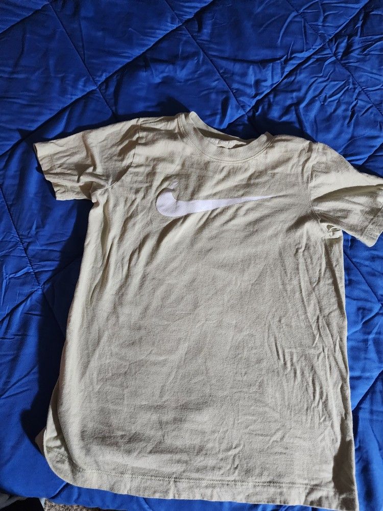 Light green , nike voice shirt in good condition