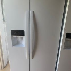 Whirlpool refrigerator side by side new scratch and dent 33”