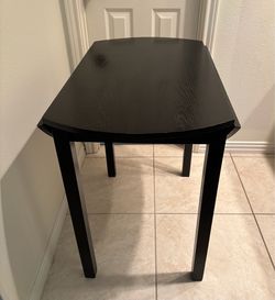 Black Finished Wood Dual Drop Leaf Round Dining Table