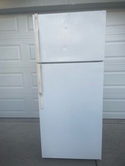 GE top and bottom refrigerator $170. Dimensions are 28Wx30Dx67H. Pick up only.