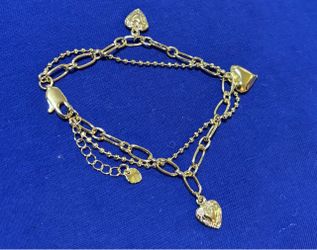Intertwined charm bracelet