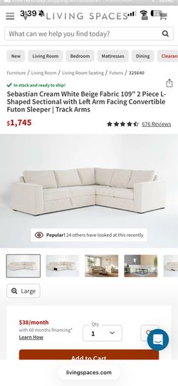 Cream Sectional Sleeper Sofa -Living Spaces