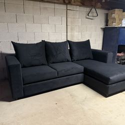 sofa with reversable chaise in black velvet