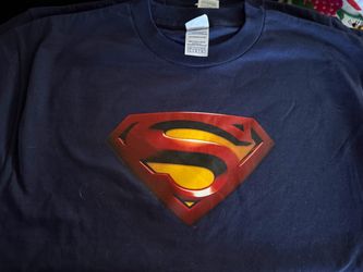 New and never worn. Three available at $15 each. Superman Logo Navy Blue T-Shirt