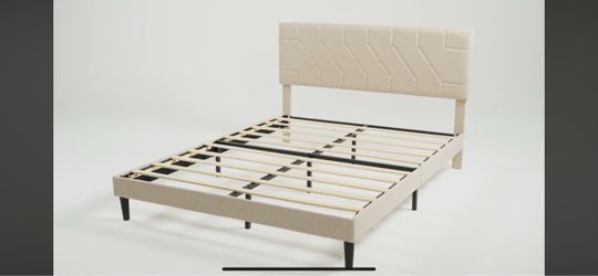 Queen upholstered bed