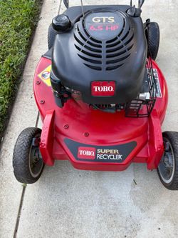 TORO self propelled mower in GOOD working condition mower has NEW oil, NEW filter, NEW spark plug and sharpened blade