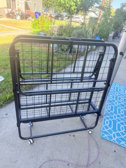 Folding rollaway twin bed frame