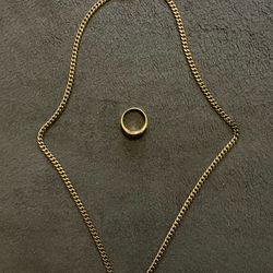 14K double gold plated chain and ring. It will not fade!
