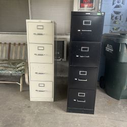 Two File Cabinets And One Desk Chair