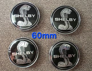 60mm or 68mm Mustang Shelby Cobra Snake center caps see all pictures sold separately SHIPPING is also AVAILABLE
