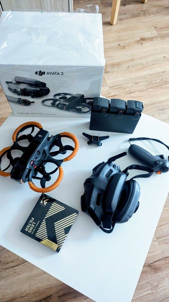 DJI Avata 2 FPV Drone Fly More Combo (3 Batteries) with Camera 4K Including Goggles 3 and RC Motion 3, Immersive Experience, Built-in Propeller Guard,