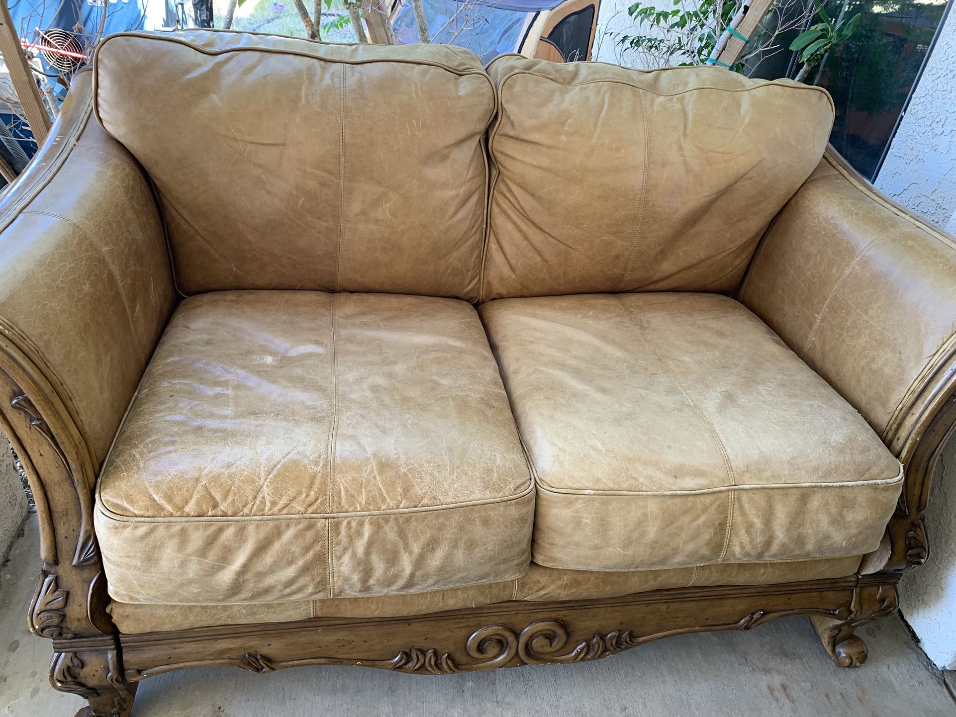 Ashleys Brown Leather Couches