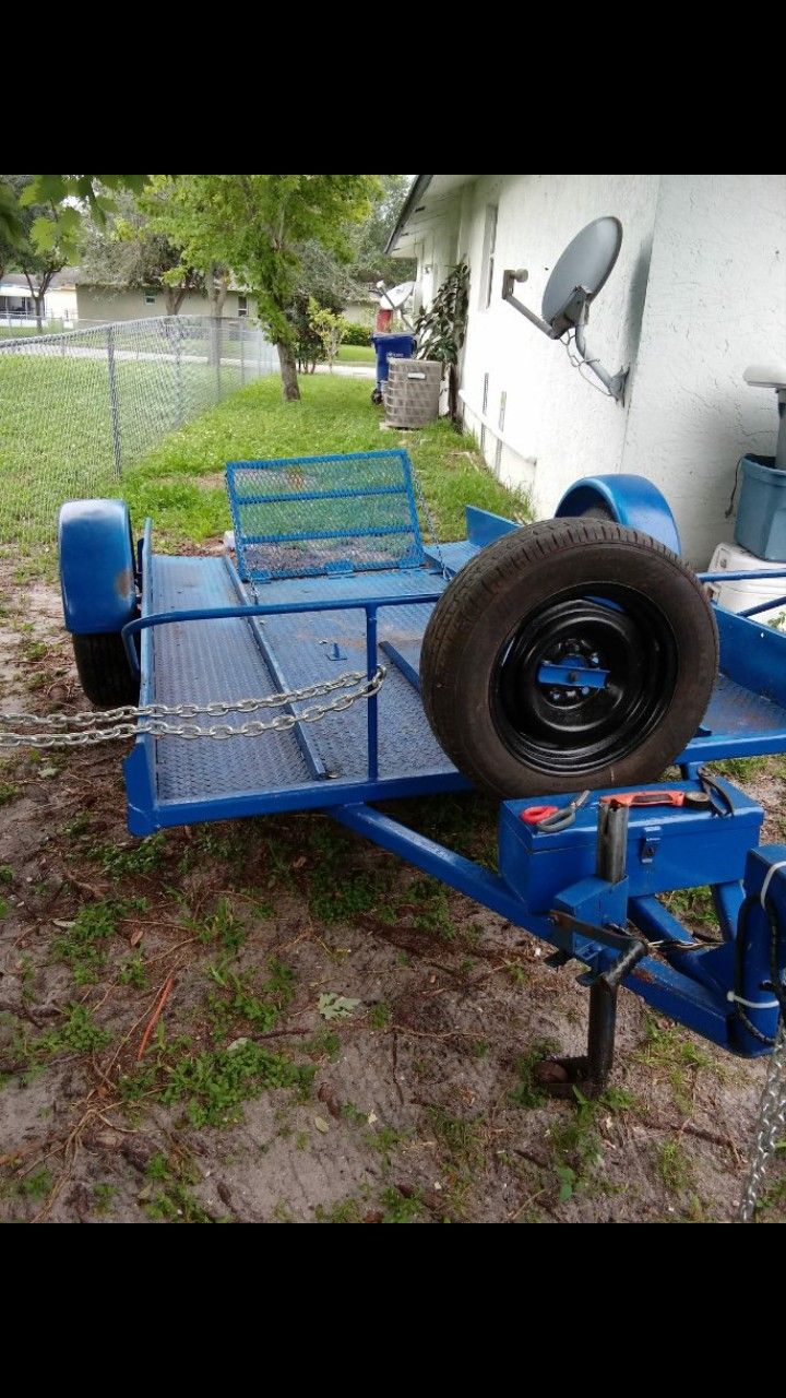 Motorcycle trailer in four wheeler trailer