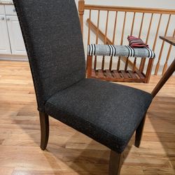 Two Dark Gray Upholstered Dining Chairs