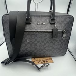 Coach Slim Brief In Signature Canvas With Trolley Sleeve 