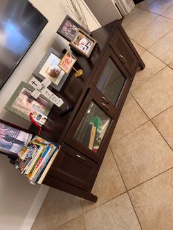 Dark Brown Wood TV Stand with Glass Doors