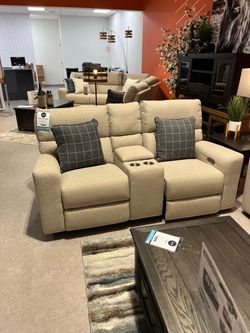Beige love seat recliner